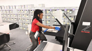 Person Scans Newspaper